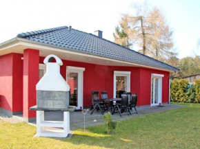 rotes Ferienhaus im Fischerdorf Kröslin